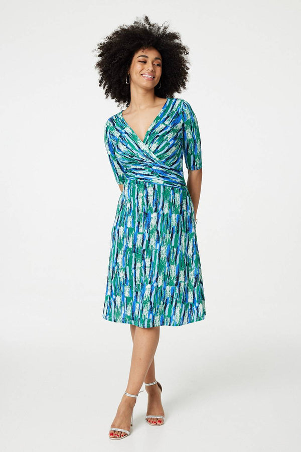 Green | Printed 1/2 Sleeve Faux Wrap Dress : Model is 5'9"/175 cm and wears UK8/EU36/US4/AUS8