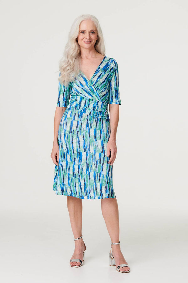 Green | Printed 1/2 Sleeve Faux Wrap Dress : Model is 5'8.5"/174 cm and wears UK8/EU36/US4/AUS8