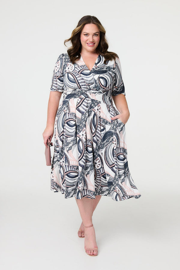 Navy | Printed 1/2 Sleeve Knee Length Wrap Dress : Model is 5'8"/172 cm and wears UK18/EU46/US14/AUS18