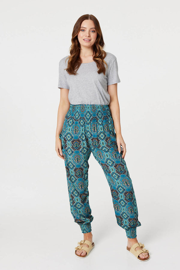 Green | Printed Pull On Tapered Pants : Model is 5'9"/175 cm and wears UK8/EU36/US4/AUS8