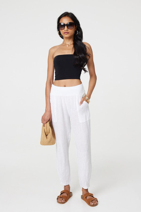 White | Relaxed Linen Blend Tapered Trousers : Model is 5'8"/172 cm and wears UK8/EU36/US4/AUS8
