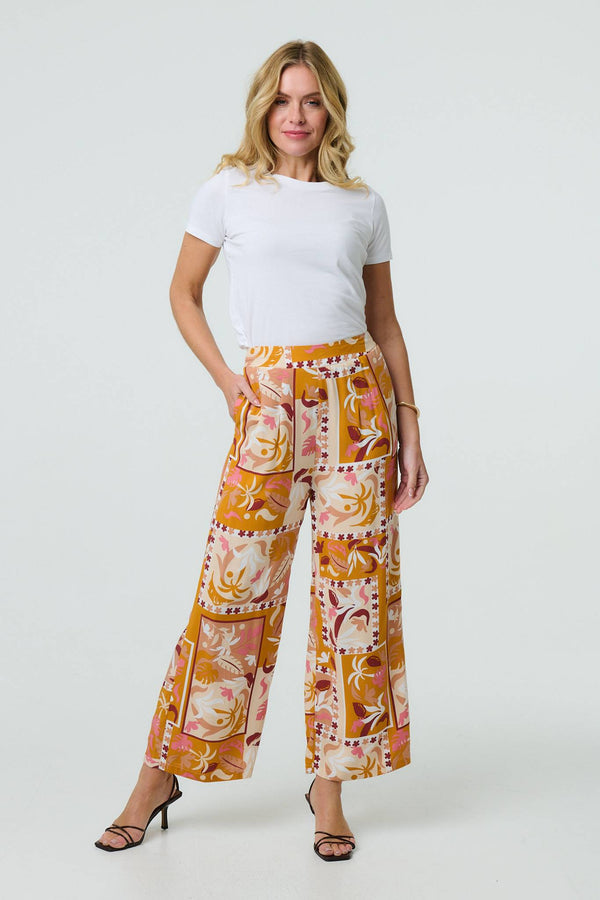 Orange | Patchwork Print High Waist Wide Leg Trousers : Model is 5'10"/178 cm and wears UK8/EU36/US4/AUS8
