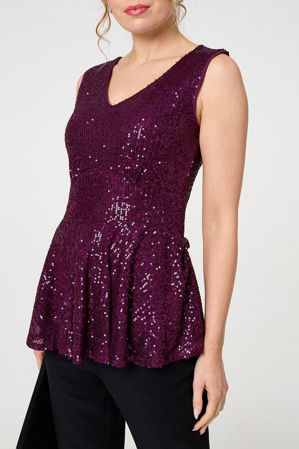 Purple | Sparkly Sequin Sleeveless Peplum Top : Model is 5'9"/175 cm and wears UK8/EU36/US4/AUS8
